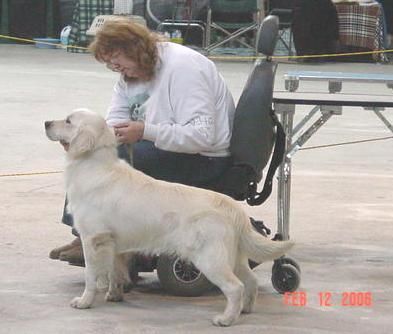 Judy and a client's dog in the ring
